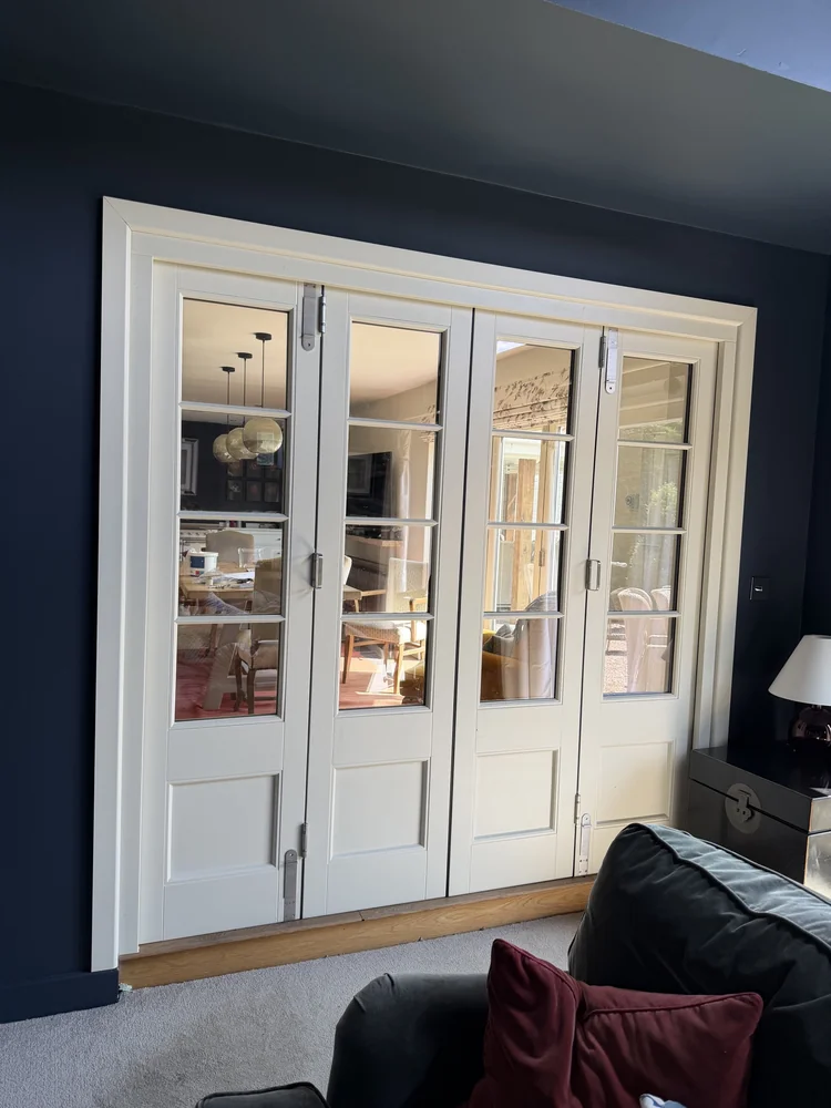 Internal Bifolds — Cream 4-panel room divider — Yorkshire. Handcrafted timber by Bailey Hague Joinery, Yorkshire.