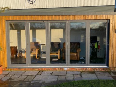 Full-width bifolds — Wooden bifold set — Leeds. Handcrafted timber by Bailey Hague Joinery, Yorkshire.