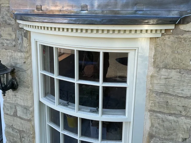 Bow sash window with dentil detail, Boston Spa