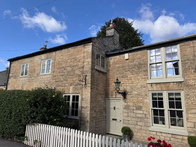 Sandstone cottage with sage sash windows, Boston Spa