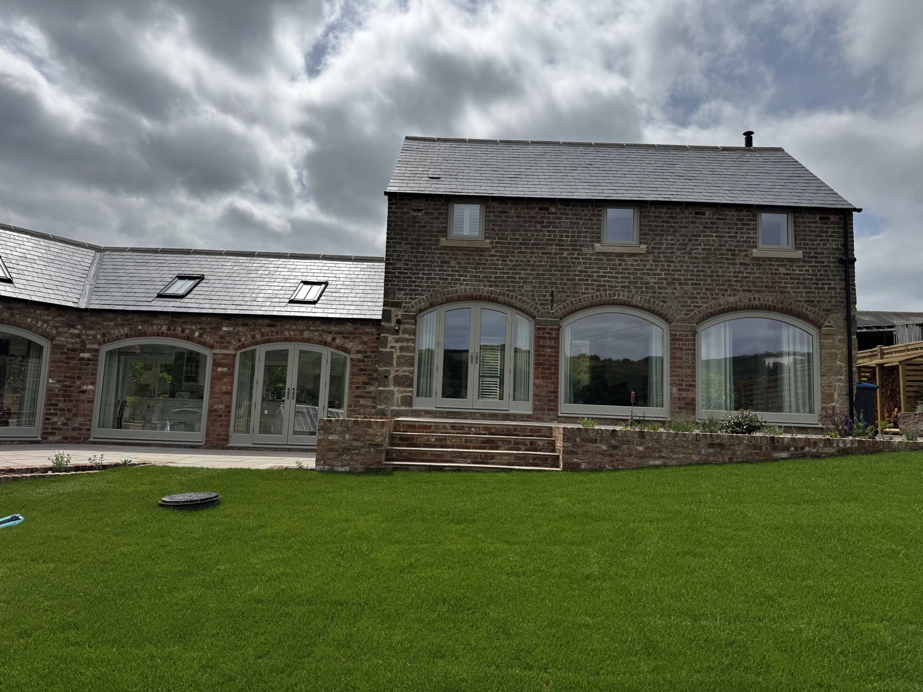 Curved Laminated Glass — Kilburn granary arches. Handcrafted timber by Bailey Hague Joinery, Yorkshire.