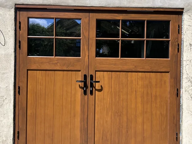 Oak-finish timber garage doors, Bishop Monkton