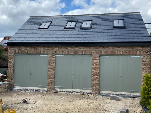 Triple sage timber garage doors, Bishop Monkton