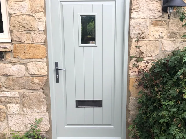 Sage cottage front door in Yorkshire stone, Ripon