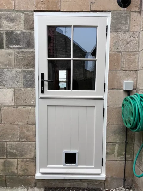 With Pet Flap — Family stable door — York. Handcrafted timber by Bailey Hague Joinery, Yorkshire.