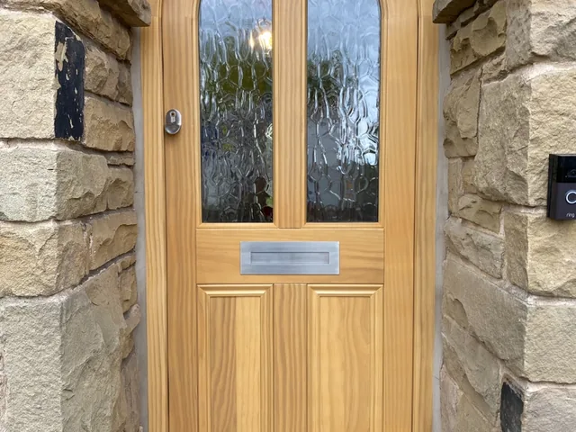 Natural oak arched front door, Wetherby
