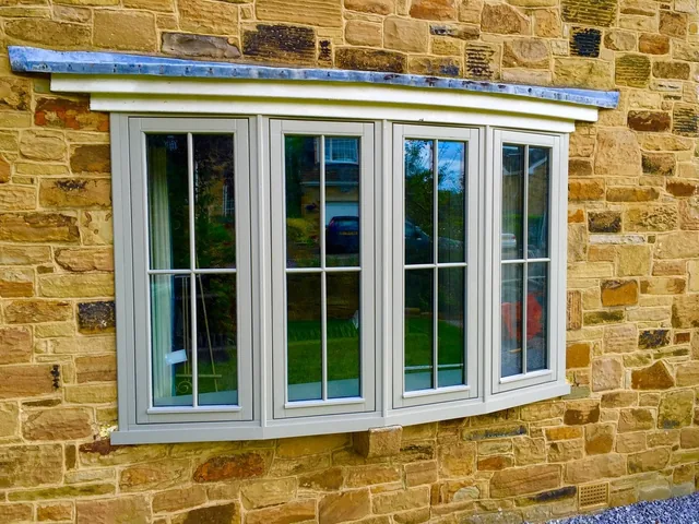 Sage timber bow window in Yorkshire stone, Wetherby