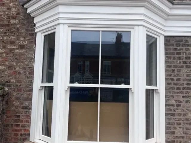 Hardwood bay sash window, York